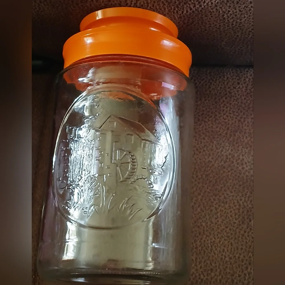 Vintage 1970s Glass Tang Jar with Orange Lid Wheel